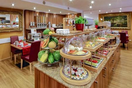 TIPTOP Hotel Burgschmiet Garni buchen